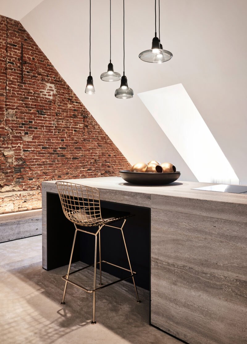 interior design multiple hanging lamps old brick details